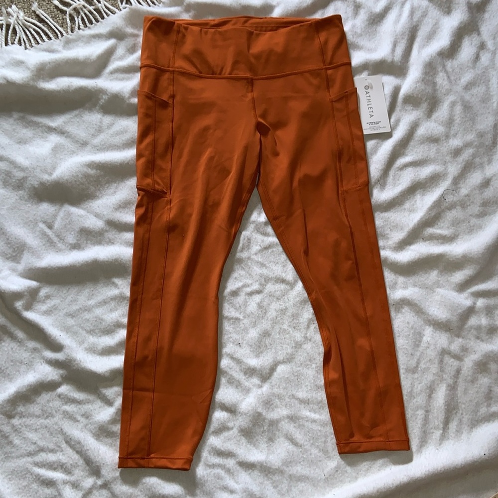ATHLETA FIRE GLOW ultimate stash II pocket leggings size large New with tag FA22